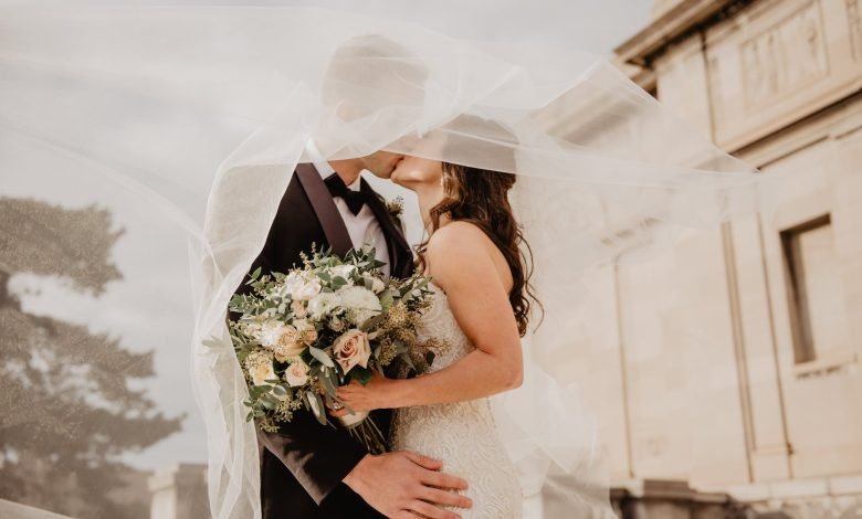 man and woman kissing