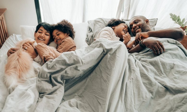 happy family in bed